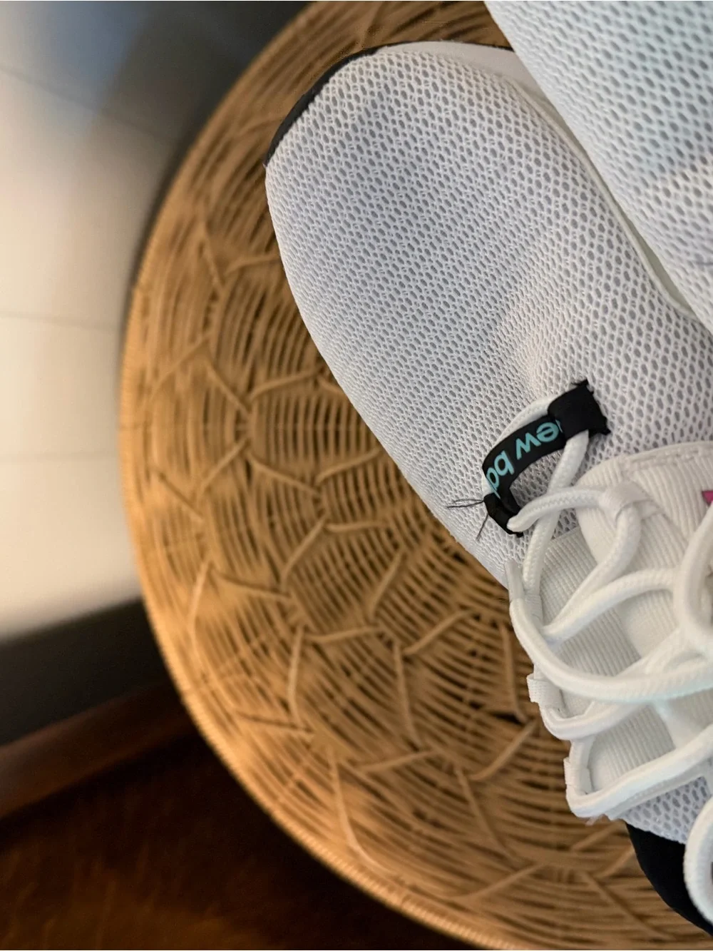 New Balance White Sneakers with Pink Detail and Black Trim